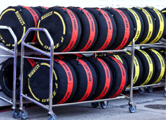 How do tyre blankets work? Rows of Formula 1 tyres in tyre blankets stacked in a trolley