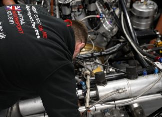 A student from the National Motorsport Academy working on a racecar